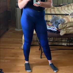 Under Armour striped purple workout leggings